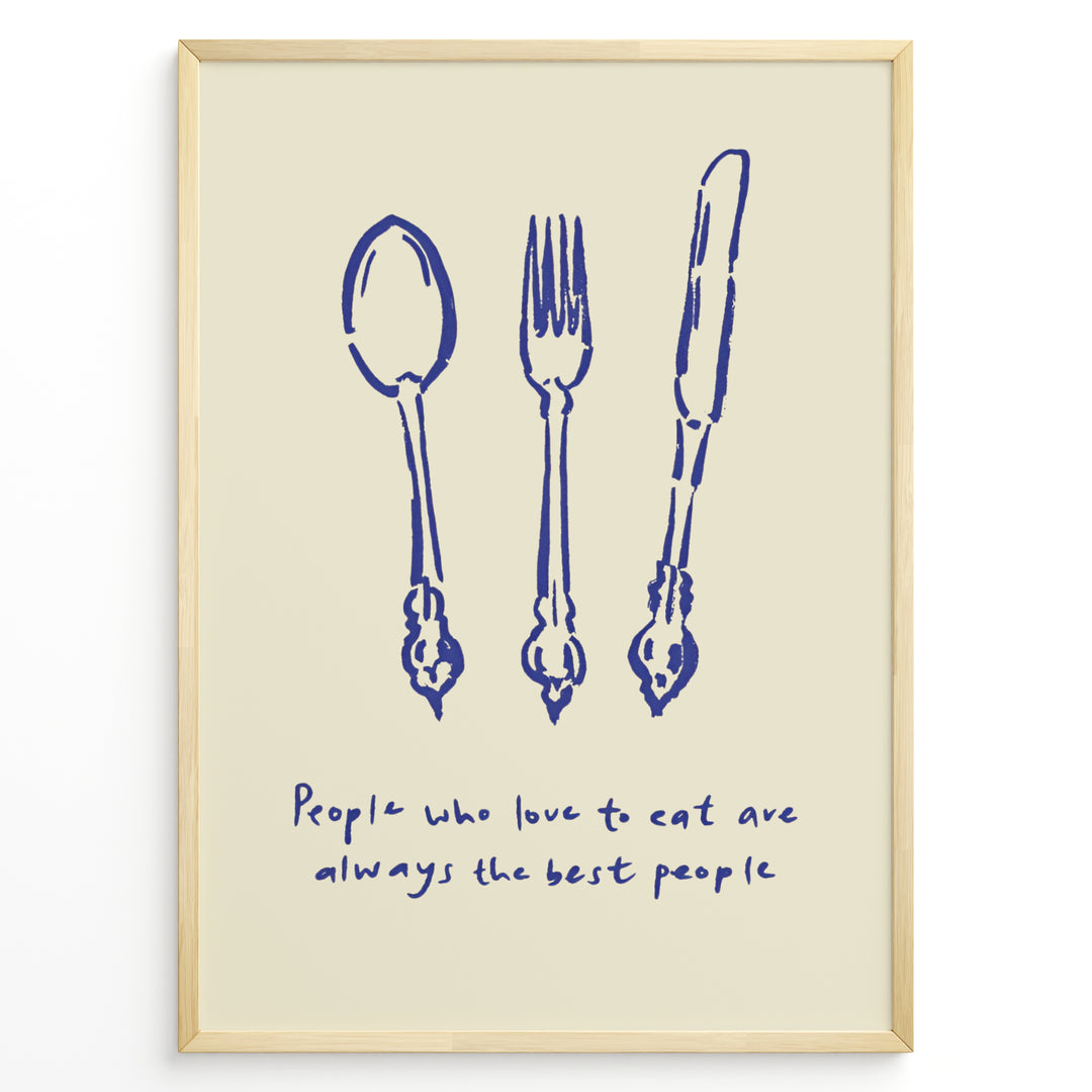 Kitchen quote poster with blue spoon, fork, and knife illustrations and the text “People who love to eat are always the best people” on a beige background in a golden frame.