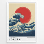 Load image into Gallery viewer, Hokusai-inspired illustration of a large blue wave with a red sun in a minimalist framed poster.
