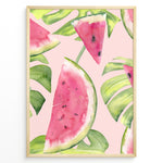Load image into Gallery viewer, Watercolor poster featuring watermelon slices and tropical green leaves on a soft pink background, framed in golden.
