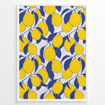 Load image into Gallery viewer, Bright lemon pattern poster with yellow lemons and blue leaves on a white background, framed in white.
