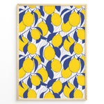Load image into Gallery viewer, Bright lemon pattern poster with yellow lemons and blue leaves on a white background, framed in golden.
