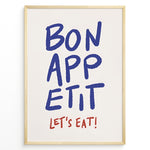 Load image into Gallery viewer, Minimalist poster with blue handwritten text “Bon Appétit” and red “Let’s Eat!” on a white background, framed in golden.
