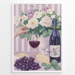 Load image into Gallery viewer, Elegant wine and cheese art print plakat with wine bottle, glass, grapes, cheese, and floral bouquet on lavender striped background in white frame.
