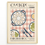 Load image into Gallery viewer, Vintage French poster with oysters on a plate, lemons, and cutlery over a red-checkered tablecloth, framed in golden.
