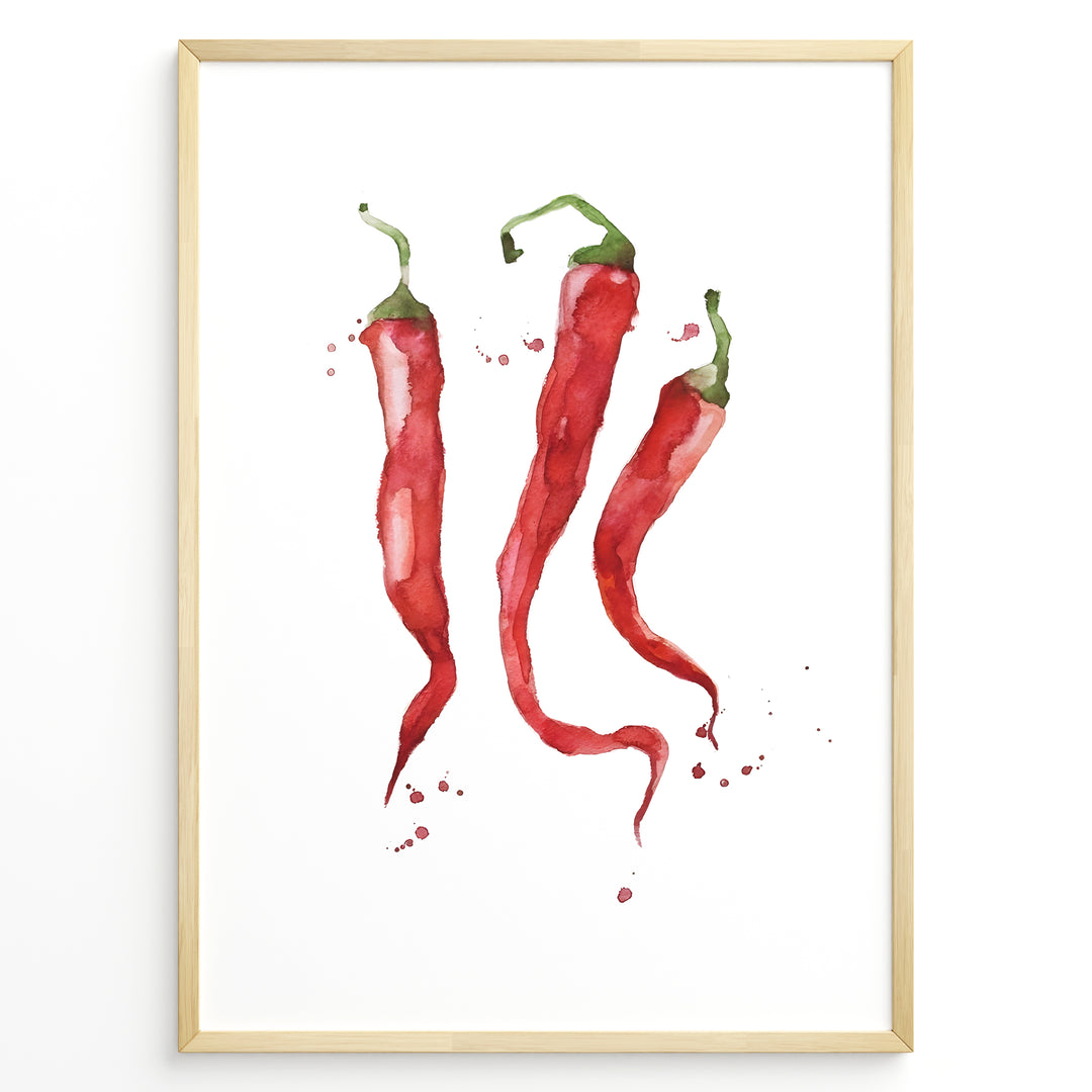 Watercolor plakat illustration of three red chili peppers with green stems and paint splatters, framed in black, ideal for modern kitchen or dining room décor.
