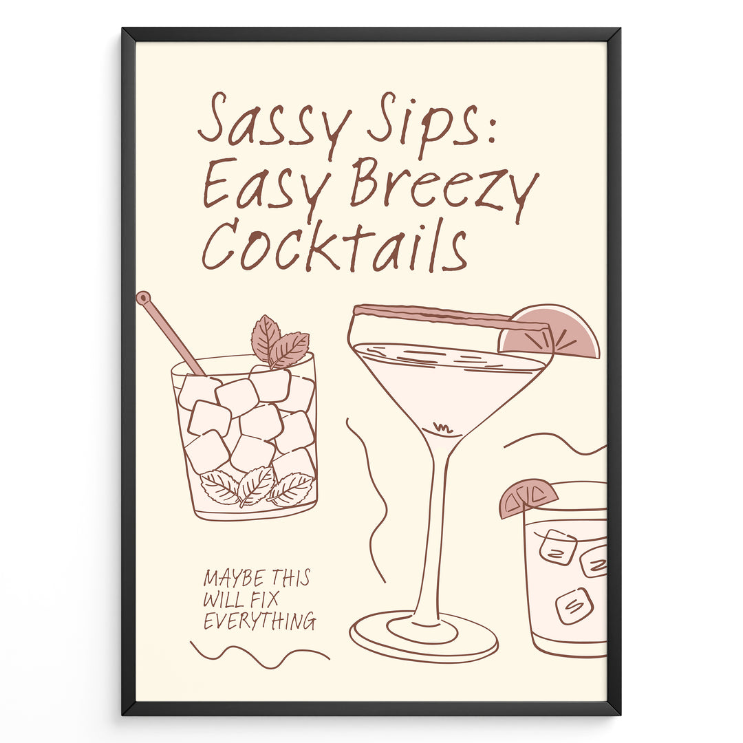 Minimalist cocktail-themed wall art with line drawings of martini and mojito glasses and the text “Sassy Sips: Easy Breezy Cocktails,” framed in black for kitchen or bar décor.