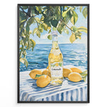 Load image into Gallery viewer, Limoncello art print plakat with a bottle of limoncello, lemons, and green leaves overlooking the blue sea on a striped tablecloth in a black frame.

