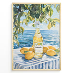 Load image into Gallery viewer, Limoncello art print plakat with a bottle of limoncello, lemons, and green leaves overlooking the blue sea on a striped tablecloth in a golden frame.
