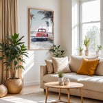 Load image into Gallery viewer, Plakat med vintage bil | Sommer og Strand Plakater | Denne plakat viser en vintage rød bil parkeret ved en strandvej med havet og palmetræer i baggrunden. Perfekt til dem, der elsker retro og strandstemning.

