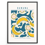 Load image into Gallery viewer, Colorful banana art print plakat with abstract teal and yellow shapes, text reading “Life is better with a bunch of bananas,” framed in black.
