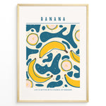 Load image into Gallery viewer, Colorful banana art print plakat with abstract teal and yellow shapes, text reading “Life is better with a bunch of bananas,” framed in golden.
