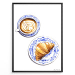 Load image into Gallery viewer, Art print of a cappuccino and croissant on blue patterned plates — French café-style kitchen wall décor.
