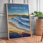 Load image into Gallery viewer, Bondi Beach Vintage Travel Plakat | Vintage Travel Poster | Denne plakat viser en farverig illustration af Bondi Beach i Australien, med bølger, der slår ind mod kysten og en by i baggrunden. Perfekt til dem, der elsker strand- og byliv.
