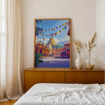 Load image into Gallery viewer, Kathmandu Vintage Travel Plakat | Vintage Travel Poster | Denne plakat viser en gylden stupa omgivet af traditionel nepalesisk arkitektur og farverige bedeflag, med sneklædte bjerge i baggrunden.
