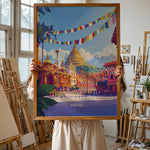 Load image into Gallery viewer, Kathmandu Vintage Travel Plakat | Vintage Travel Poster | Denne plakat viser en gylden stupa omgivet af traditionel nepalesisk arkitektur og farverige bedeflag, med sneklædte bjerge i baggrunden.
