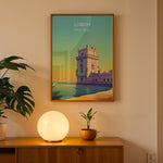 Load image into Gallery viewer, Lissabon Vintage Travel Plakat | Vintage Travel Poster | Denne plakat viser et historisk tårn ved vandet i Lissabon, Portugal, i en farverig og stiliseret illustration.
