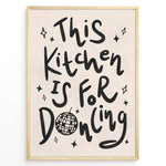Load image into Gallery viewer, Black and white quote print reading “This Kitchen Is for Dancing” with a disco ball illustration.
