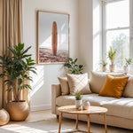 Load image into Gallery viewer, Plakat med surfbræt på stranden | Sommer og Strand Plakater | Denne plakat viser et surfbræt stående oprejst på en rolig sandstrand med havet i baggrunden. Perfekt til strand- og surfentusiaster.
