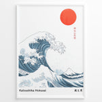 Load image into Gallery viewer, Minimalist Japanese art poster showing a large blue wave, red sun, and Mount Fuji, inspired by Hokusai’s Great Wave, framed in a black border.
