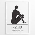 Load image into Gallery viewer, Seated Silhouette Plakat | Matisse Poster | Minimalistisk sort figur på hvid baggrund
