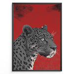 Load image into Gallery viewer, Illustrated leopard portrait with detailed spots and green eyes on a textured red background, framed in black.
