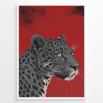 Load image into Gallery viewer, Illustrated leopard portrait with detailed spots and green eyes on a textured red background, framed in black.
