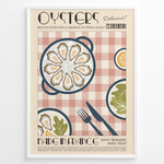 Load image into Gallery viewer, Vintage French oysters poster with illustrated oyster platter, lemon slices, and cutlery on a pink checkered background in a white frame.
