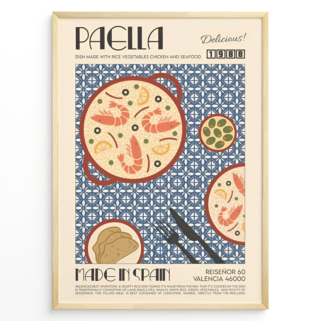Vintage Spanish paella poster with illustrated pan of rice, prawns, and lemon slices on a blue patterned background in a gold frame.