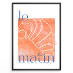 Load image into Gallery viewer, Le Matin poster with minimalist croissant illustration in orange and blue text on a white background in a black frame.
