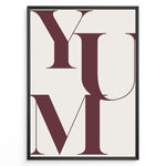 Load image into Gallery viewer, Minimalist typography wall art print plakat with the word “YUM” in large maroon letters on a cream background framed in black.
