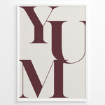 Load image into Gallery viewer, Minimalist typography wall art print plakat with the word “YUM” in large maroon letters on a cream background framed in black.
