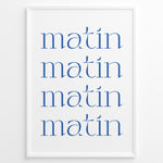 Load image into Gallery viewer, Minimalist French typography poster with the word “matin” repeated four times in blue text on a white background in a white frame.
