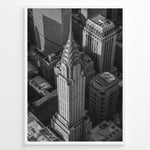 Load image into Gallery viewer, Fashion Plakat | Aerial View of the Chrysler Building in Black and White Plakaty.dk | Black and white aerial view of the Chrysler Building surrounded by New York City skyscrapers.
