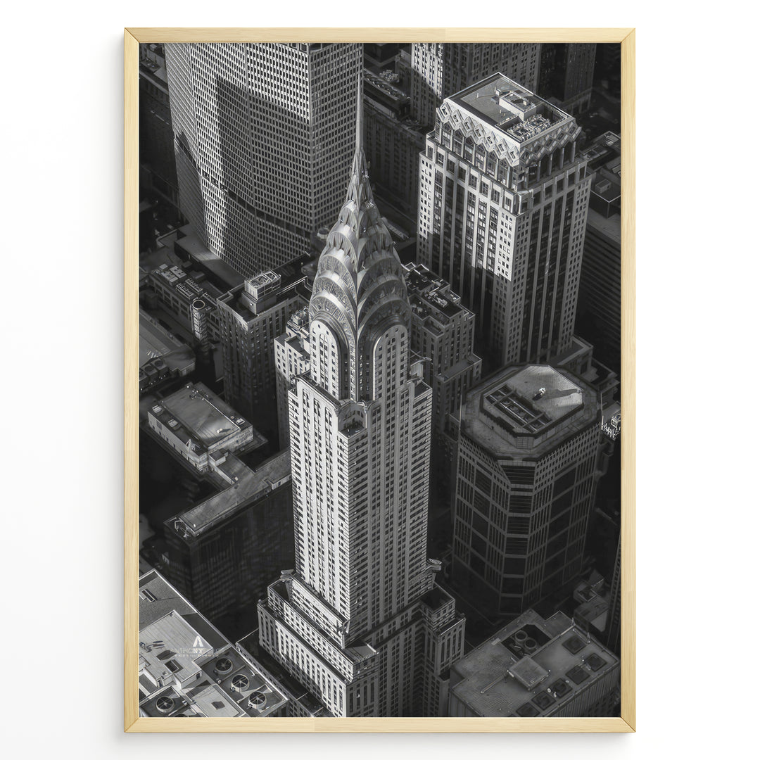 Fashion Plakat | Aerial View of the Chrysler Building in Black and White Plakaty.dk | Black and white aerial view of the Chrysler Building surrounded by New York City skyscrapers.
