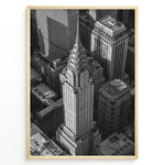 Load image into Gallery viewer, Fashion Plakat | Aerial View of the Chrysler Building in Black and White Plakaty.dk | Black and white aerial view of the Chrysler Building surrounded by New York City skyscrapers.
