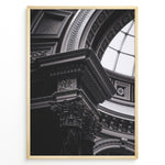Load image into Gallery viewer, Fashion Plakat | Architectural Elegance: Classical Interior with Ornate Column and Dome Plakaty.dk | Close-up photograph of an ornate Corinthian column supporting a decorated entablature beneath a domed ceiling with intricate molding and classical architectural detailing.
