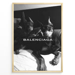 Load image into Gallery viewer, Fashion Plakat | Balenciaga Poster Featuring Dobermans in Black and White Plakaty.dk | Black and white poster of two Dobermans lying on a bed with the Balenciaga logo across the center.
