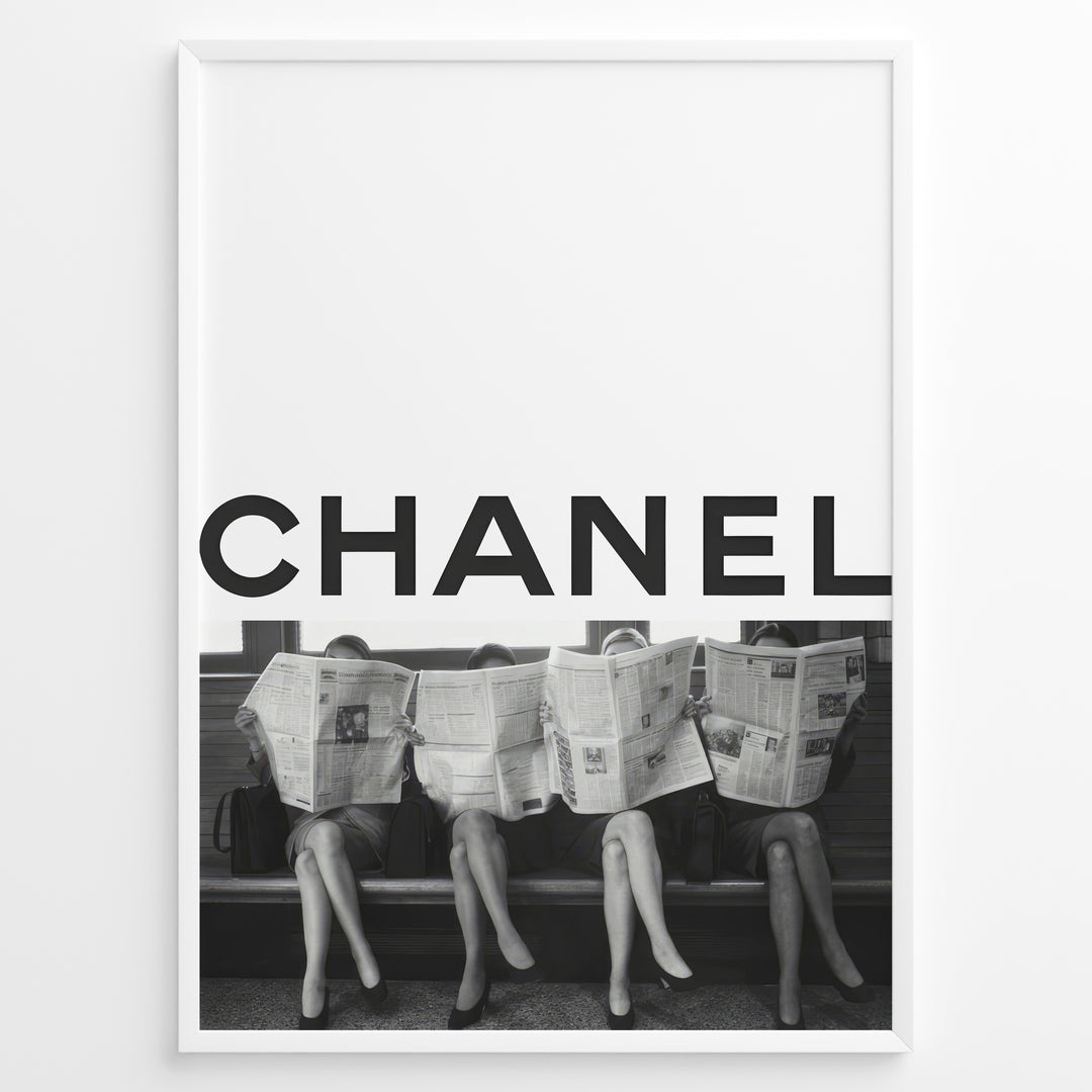 Fashion Plakat | CHANEL Newspaper Bench – Fashion Art Poster Plakaty.dk | Black and white fashion poster of four women sitting on a bench reading newspapers, with the bold text "CHANEL" across the top half of the image.