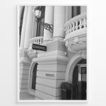 Load image into Gallery viewer, Fashion Plakat | Chanel Boutique Exterior – Monte Carlo, Monaco Plakaty.dk | Black and white photo of the Chanel storefront in Monte Carlo, Monaco, showcasing ornate architecture with columns, balconies, and a hanging sign.
