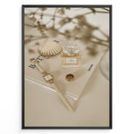 Load image into Gallery viewer, Fashion Plakat | Chanel No. 5 Perfume Flat Lay with Watch and Books – Neutral Aesthetic Print Plakaty.dk | Flat lay of Chanel No. 5 perfume bottle, gold watch, ring, and decorative shell on fashion books with soft floral blur in neutral tones.
