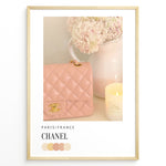 Load image into Gallery viewer, Fashion Plakat | Chanel in Bloom – Soft Pink Elegance Poster Plakaty.dk | Blush pink Chanel quilted handbag beside pastel flowers and a candle, evoking soft luxury and feminine Parisian style.
