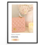 Load image into Gallery viewer, Fashion Plakat | Chanel in Bloom – Soft Pink Elegance Poster Plakaty.dk | Blush pink Chanel quilted handbag beside pastel flowers and a candle, evoking soft luxury and feminine Parisian style.
