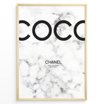 Load image into Gallery viewer, Fashion Plakat | Coco Chanel Quote Poster on Marble Background – Fashion Wall Art Plakaty.dk | Minimalist poster with large &quot;COCO&quot; text and a Chanel quote on a white marble background: &quot;I don&#39;t do fashion, I am fashion.&quot;
