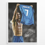 Load image into Gallery viewer, Cristiano Ronaldo fodbold plakat hvor han holder Real Madrid trøje med nummer 7 i ikonisk Champions League øjeblik.
