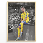 Load image into Gallery viewer, Cristiano Ronaldo sitting on barrier wearing Al Nassr yellow jersey framed plakat
