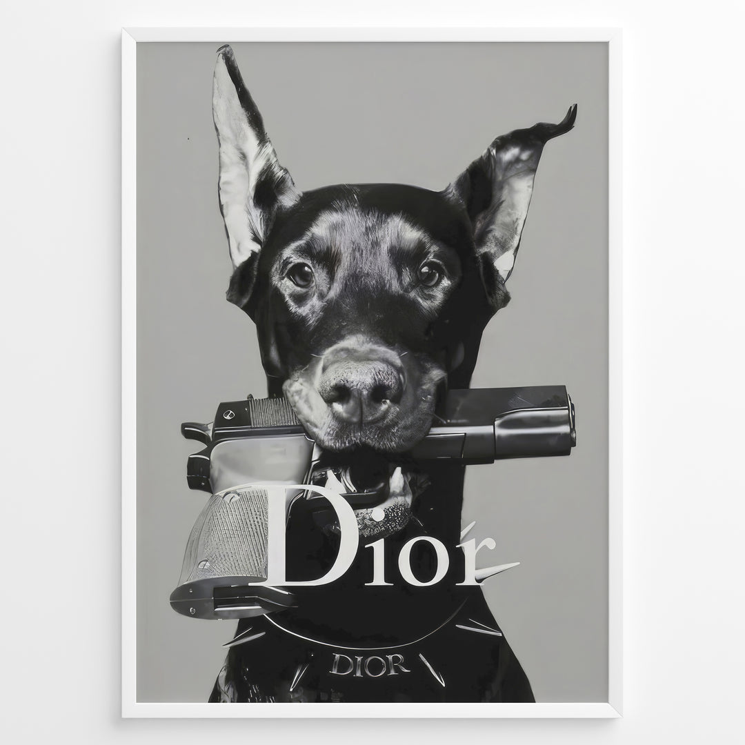Fashion Plakat | Dior Guard Dog Poster – Bold Fashion Statement Wall Art Plakaty.dk | Black and white image of a Doberman dog holding a handgun in its mouth, wearing a Dior collar, with "Dior" text overlayed – a bold, edgy luxury fashion print.