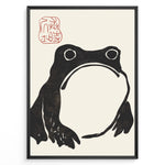 Load image into Gallery viewer, Framed Japanese ink art poster featuring a minimalist black frog illustration with red calligraphy stamp on a beige background.
