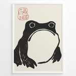 Load image into Gallery viewer, Framed Japanese ink art poster featuring a minimalist black frog illustration with red calligraphy stamp on a beige background.
