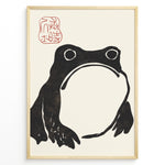 Load image into Gallery viewer, Japanese minimalist black frog art print plakat with red stamp detail in a modern black frame on cream background.
