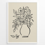 Load image into Gallery viewer, Minimalist black and white floral vase line art print plakat with botanical design in a black frame on beige background
